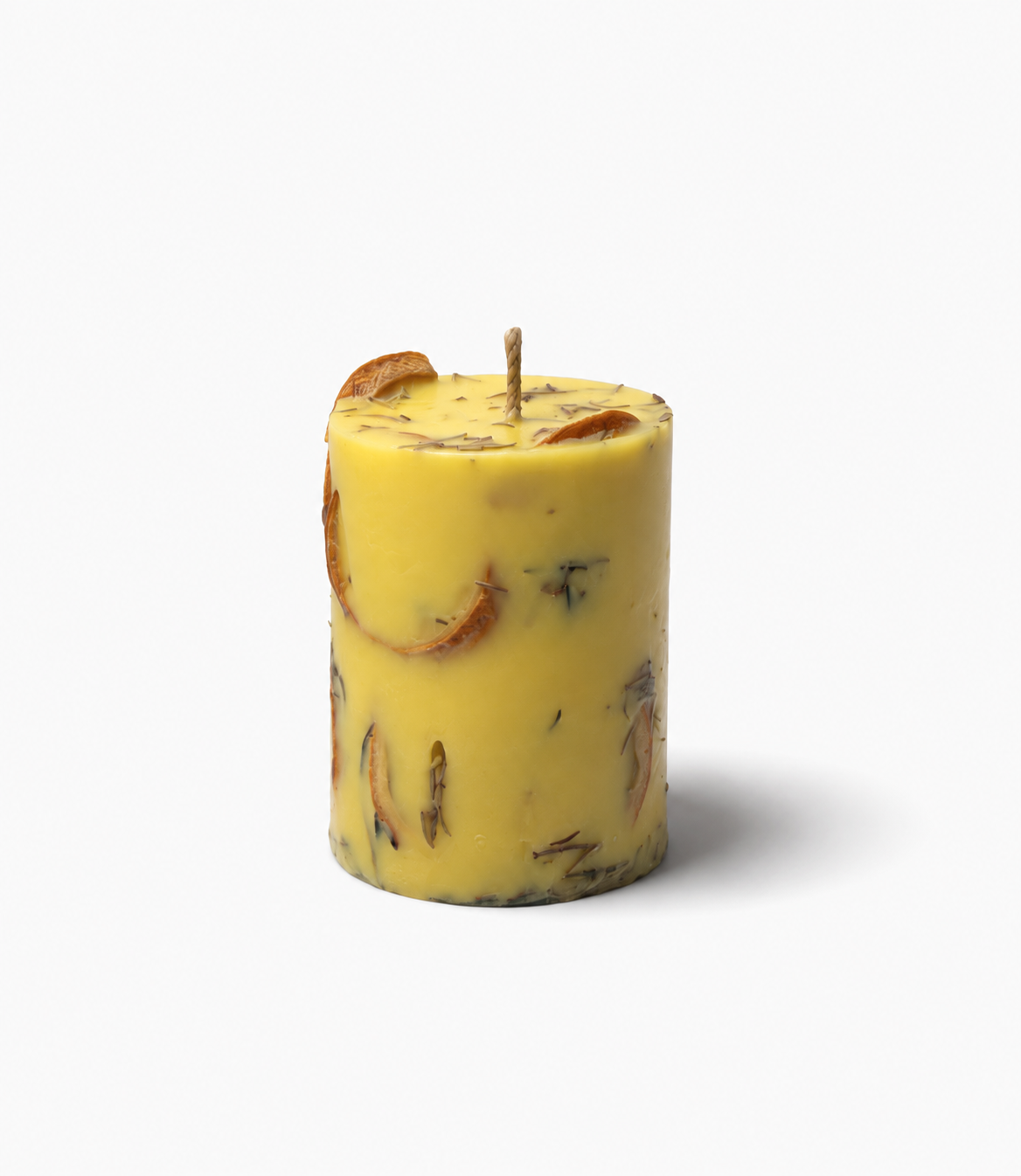 Goa Dourado candle in a styled home corner