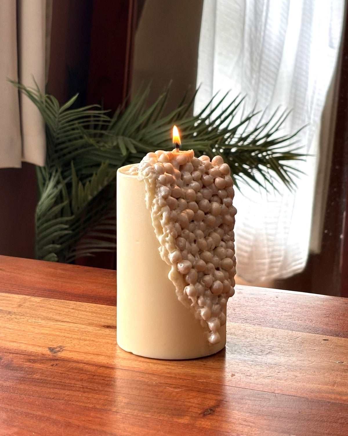 Jaipur Pearl, unlit, on a plain surface
