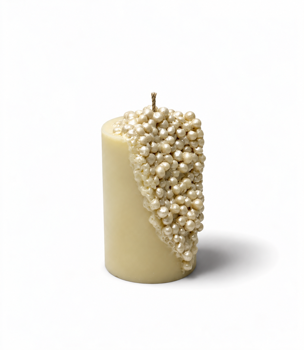 Jaipur Pearl candle in a styled home corner